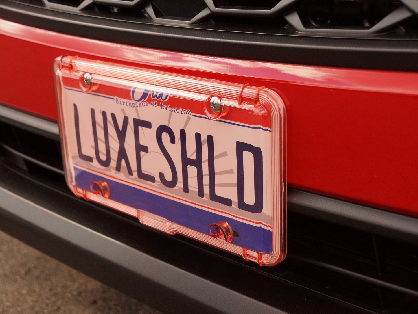 Luxe Shield, Premium Pink License Plate Cover includes Stainless Screws