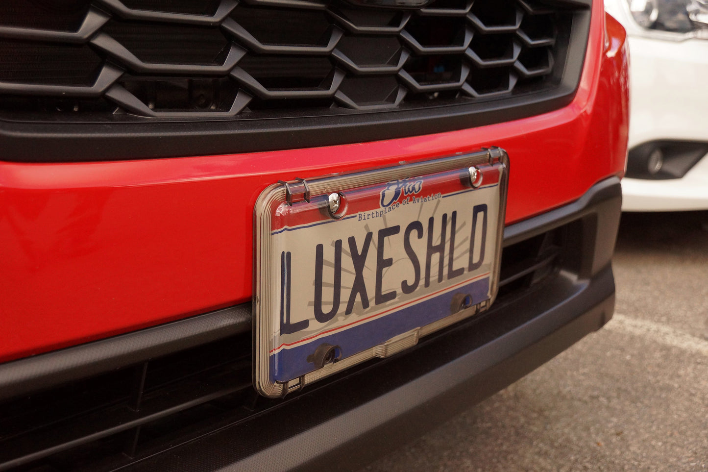 Luxe Shield, Premium Smoked License Plate Cover includes Stainless Screws